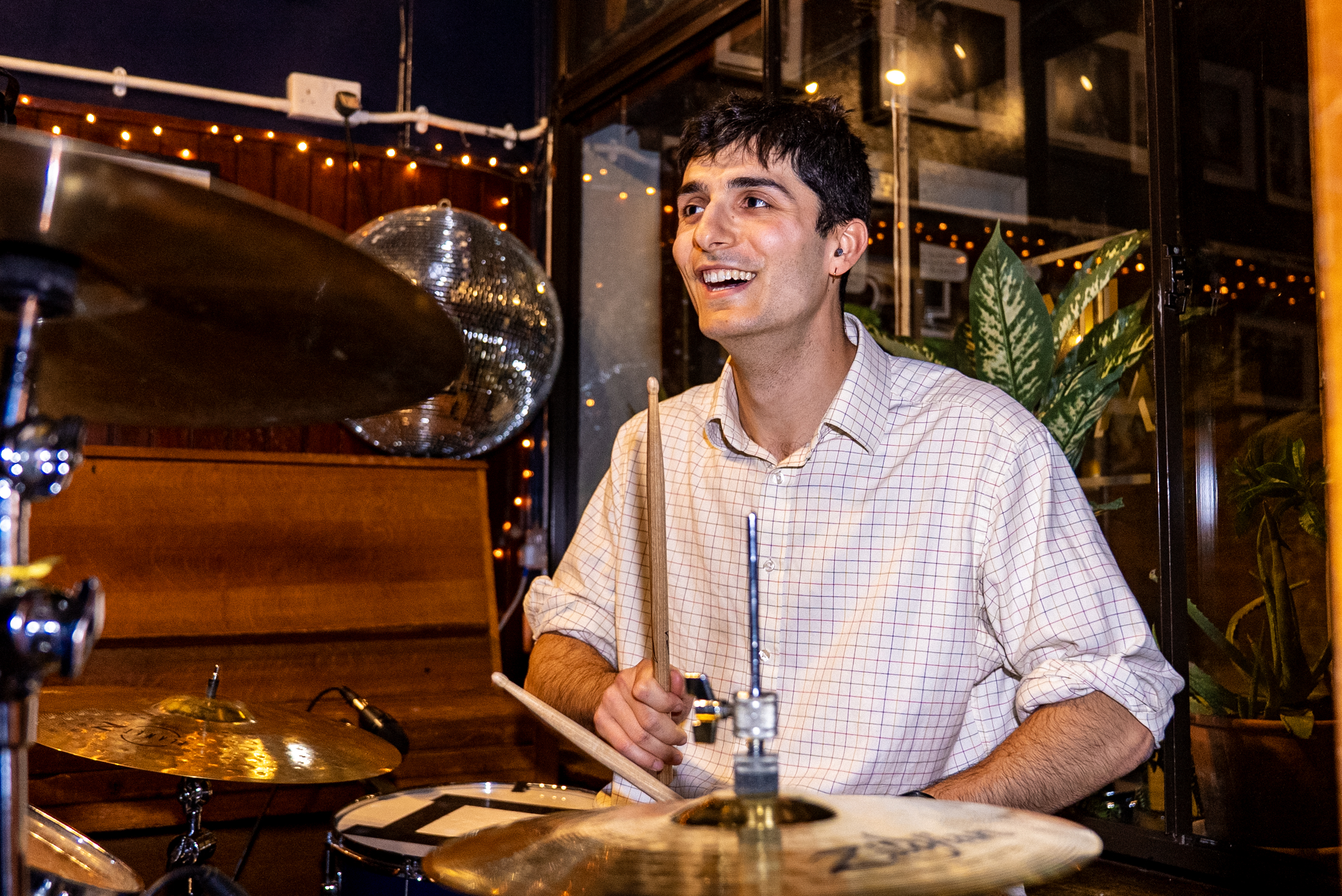Musicians enjoying playing together, smiling after rehearsal